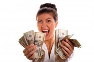 excited_woman_holding_cash_2246039_hh1k-1