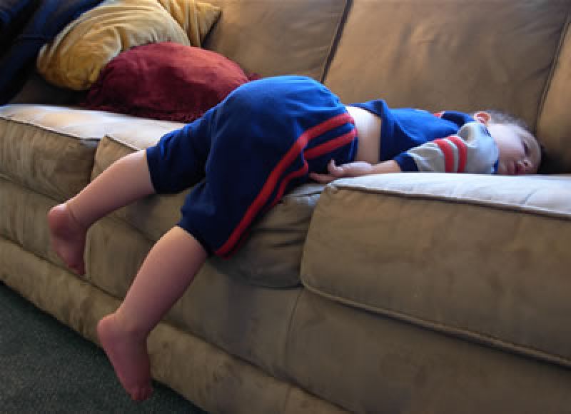 kid-sleeping-on-couch