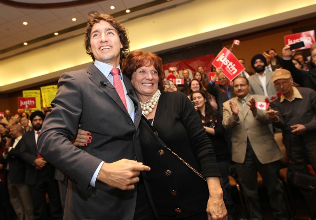 Liberal leadership candidate Justin Trudeau, right, hugs his mother Margaret as he attends a event in Richmond, B.C., Wednesday, Oct. 3, 2012. Trudeau announced Tuesday in Montreal that he will run for the leadership of the Liberal party of Canada. THE CANADIAN PRESS/Jonathan Hayward