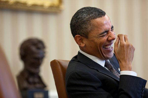 President Barack Obama laughs during a meeting in the Oval Office, Jan. 24, 2011. (Official White House Photo by Pete Souza) This official White House photograph is being made available only for publication by news organizations and/or for personal use printing by the subject(s) of the photograph. The photograph may not be manipulated in any way and may not be used in commercial or political materials, advertisements, emails, products, promotions that in any way suggests approval or endorsement of the President, the First Family, or the White House.