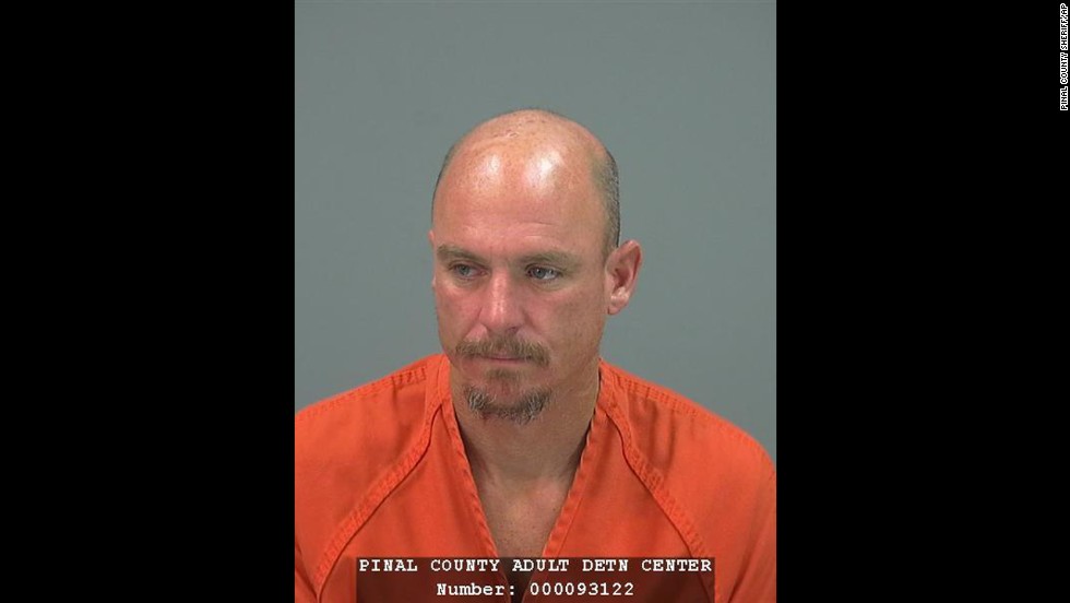 This image provided by the Pinal County Sheriff's office shows the booking photo of Joseph Andrew Dekenipp an inmate of the Pinal County Adult Detention Center who escaped by climbing two walls and crawling through razor wire and was reportedly meeting his sweetheart on Valentine's Day. He was arrested in the town of Coolidge, a few hours after he escaped Friday Feb. 14, 2014. (AP Photo/Pinal County Sheriff)