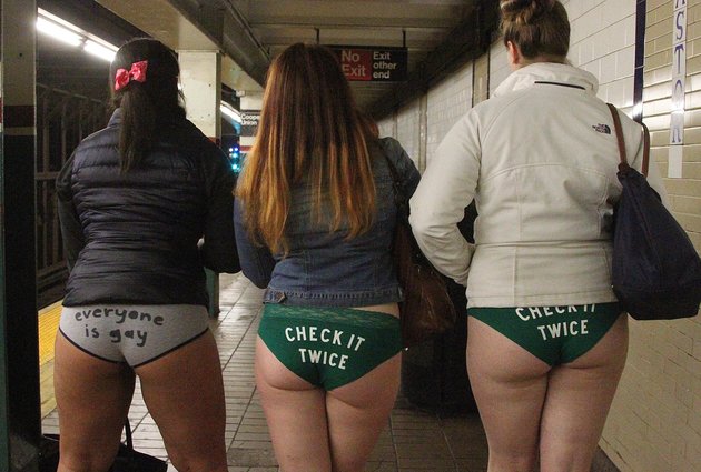 NEW YORK, NY - JANUARY 10: Unidentified participants in No Pants Day 2016 on the subway platform in New York, NY on January 10, 2016. Photo Credit: Rainmaker Photo/MediaPunch/IPX