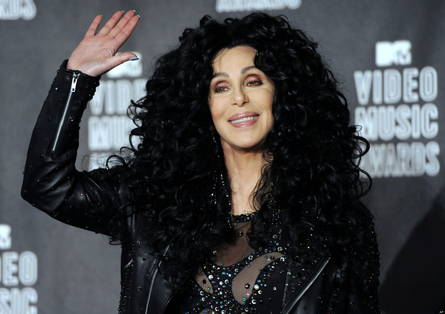 FILE - In this Sept. 12, 2010 file photo, Cher poses in the press room at the MTV Video Music Awards in Los Angeles. (AP Photo/Chris Pizzello, file)